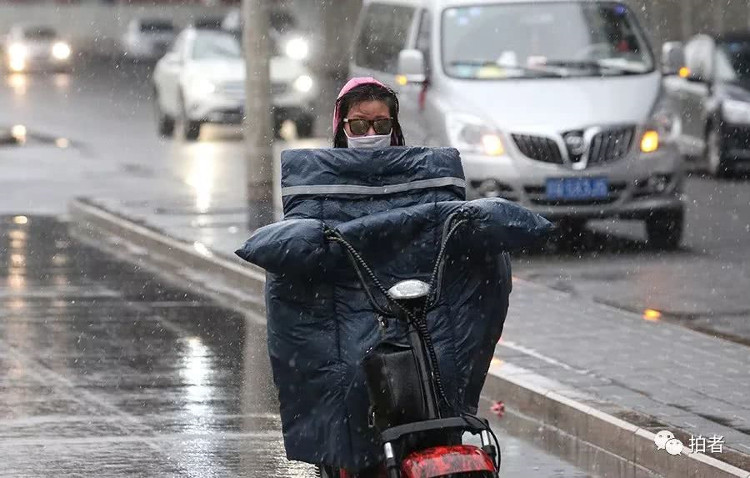 Sau 30 năm, Bắc Kinh lại đón tuyết rơi vào tháng 4