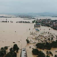 Chùm ảnh lũ lịch sử nhấn chìm đường sá, ngập hàng ngàn ngôi nhà ở Quảng Bình