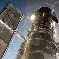 Vừa hoạt động trở lại, kính viễn vọng không gian Hubble đã chụp được ảnh hai thiên hà va vào nhau